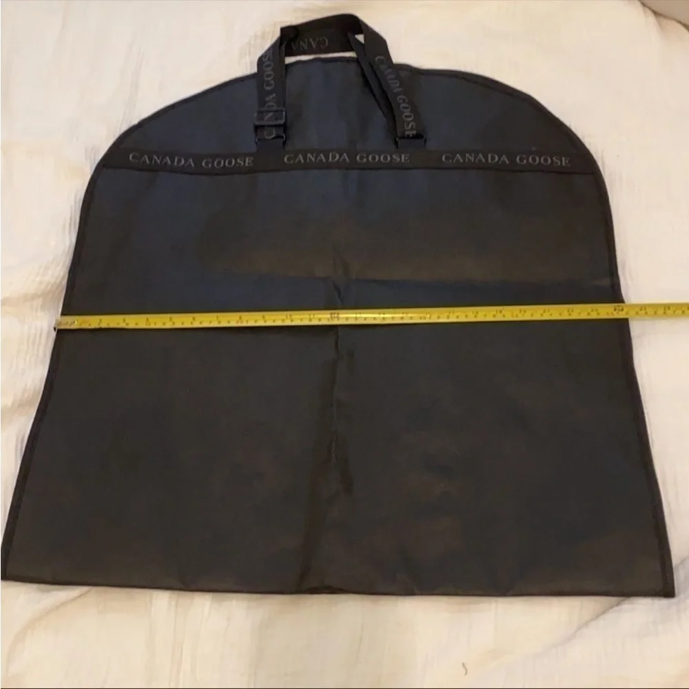 Canada Goose coat black dust bag . New.